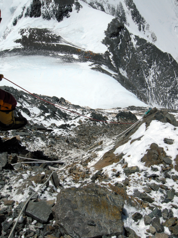 Ropes and rock band above South Col